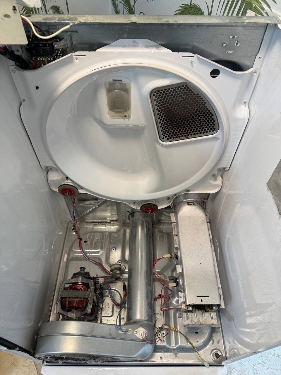 Dryer repair in progress in a Naples home