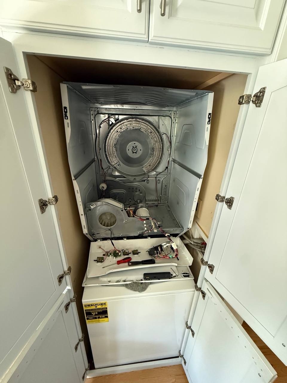 Dryer repair in progress in a Naples home