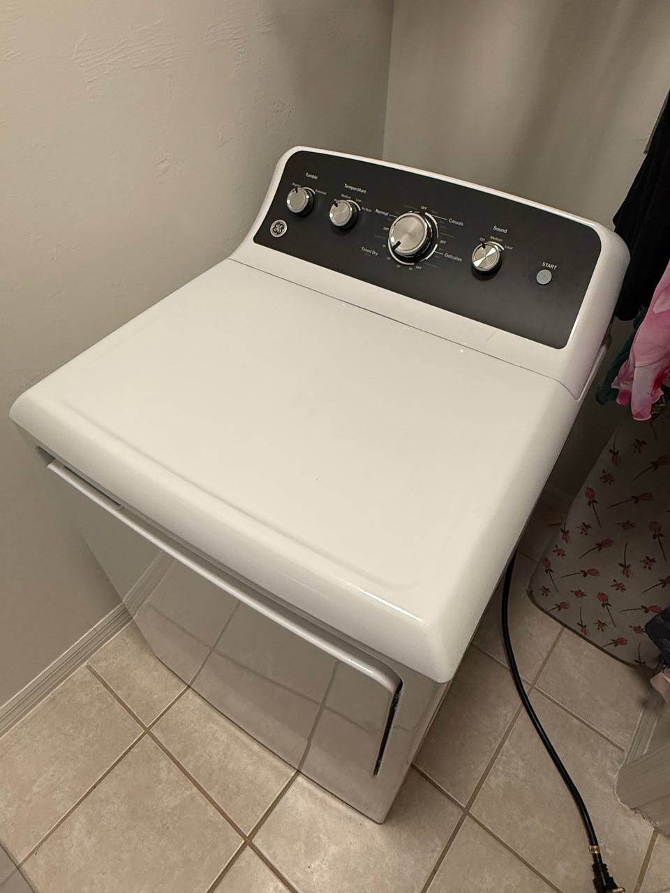 Dryer repair in progress in a Naples home
