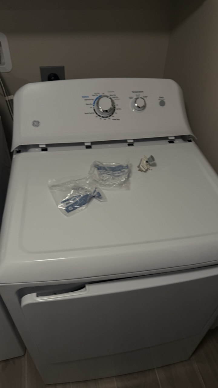 Dryer repair in progress in a Naples home