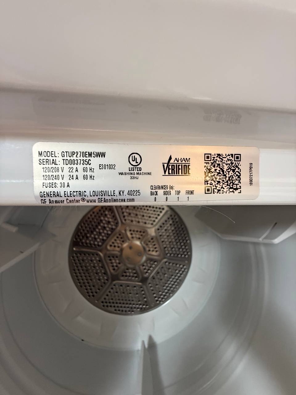 Dryer repair in progress in a Naples home