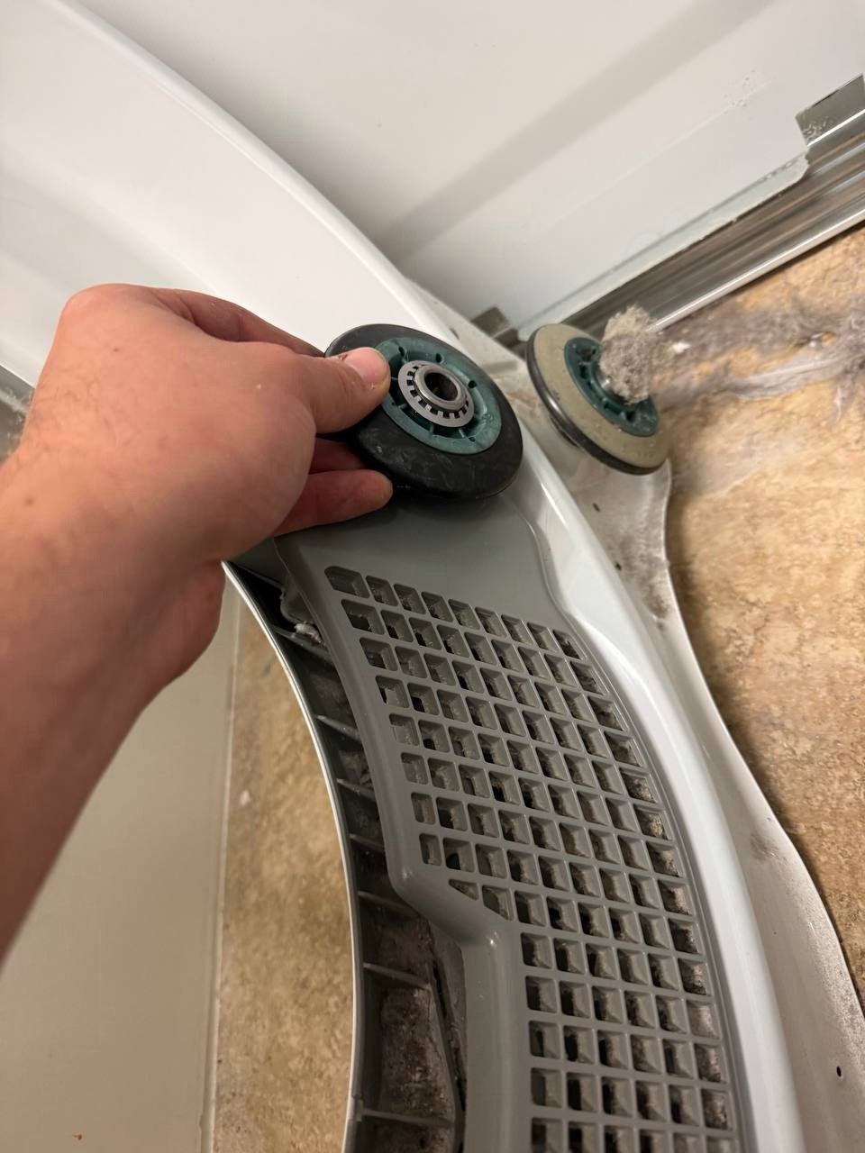 Dryer repair in progress in a Naples home